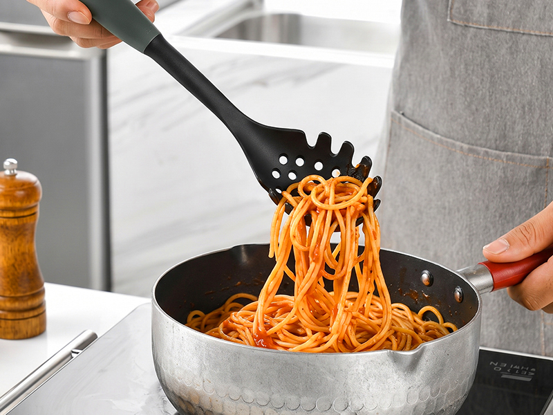 L-TOOLS kitchen utensils including ladles and serving tools for cooking applications.