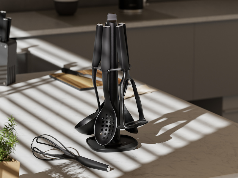 L-TOOLS retail display of various silicone and metal kitchen utensils, highlighting organized product presentation.