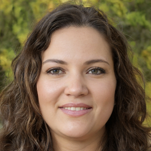 L-TOOLS professional headshot of a smiling woman, suitable for corporate or team profile representation.