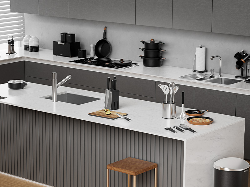 L-TOOLS modern kitchen setup with countertop, sink, and organized utensils, highlighting clean and functional cooking space.