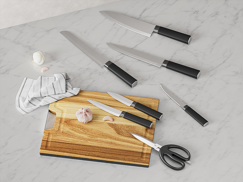 L-TOOLS chef knife set arranged on a countertop with cutting boards, emphasizing organized kitchen setup.
