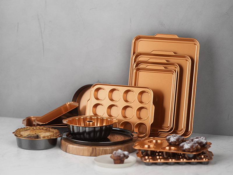 L-TOOLS various baking trays including silicone and metal, demonstrating versatile kitchen bakeware.