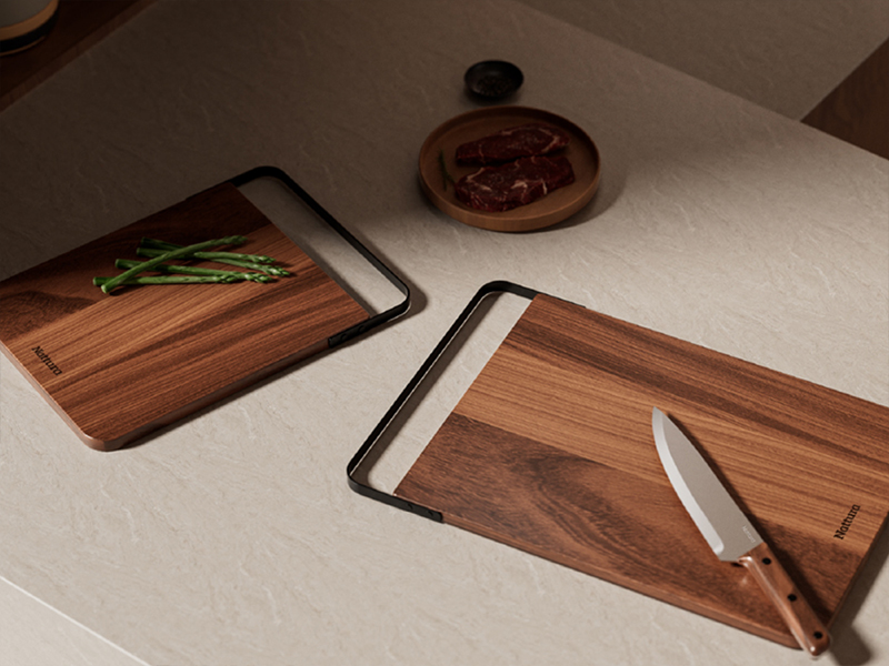L-TOOLS cutting board and knife comparison display showcasing premium food preparation tools.