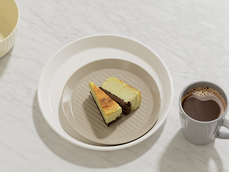 L-TOOLS plated dessert with matcha cake and chocolate mousse, styled for gourmet presentation.