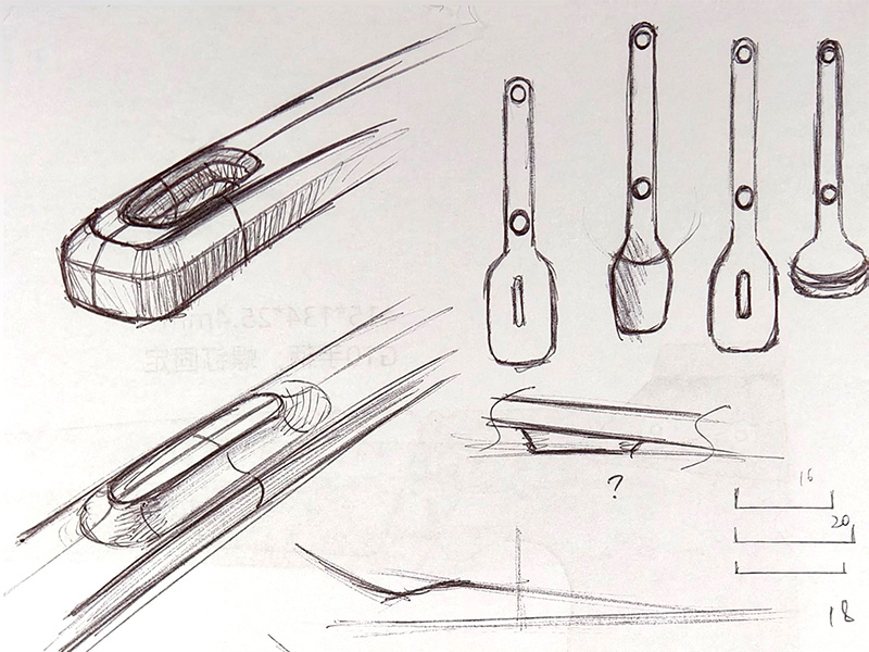 L-TOOLS hand drawing sketches of kitchen utensils and spatulas, highlighting product design and conceptualization.
